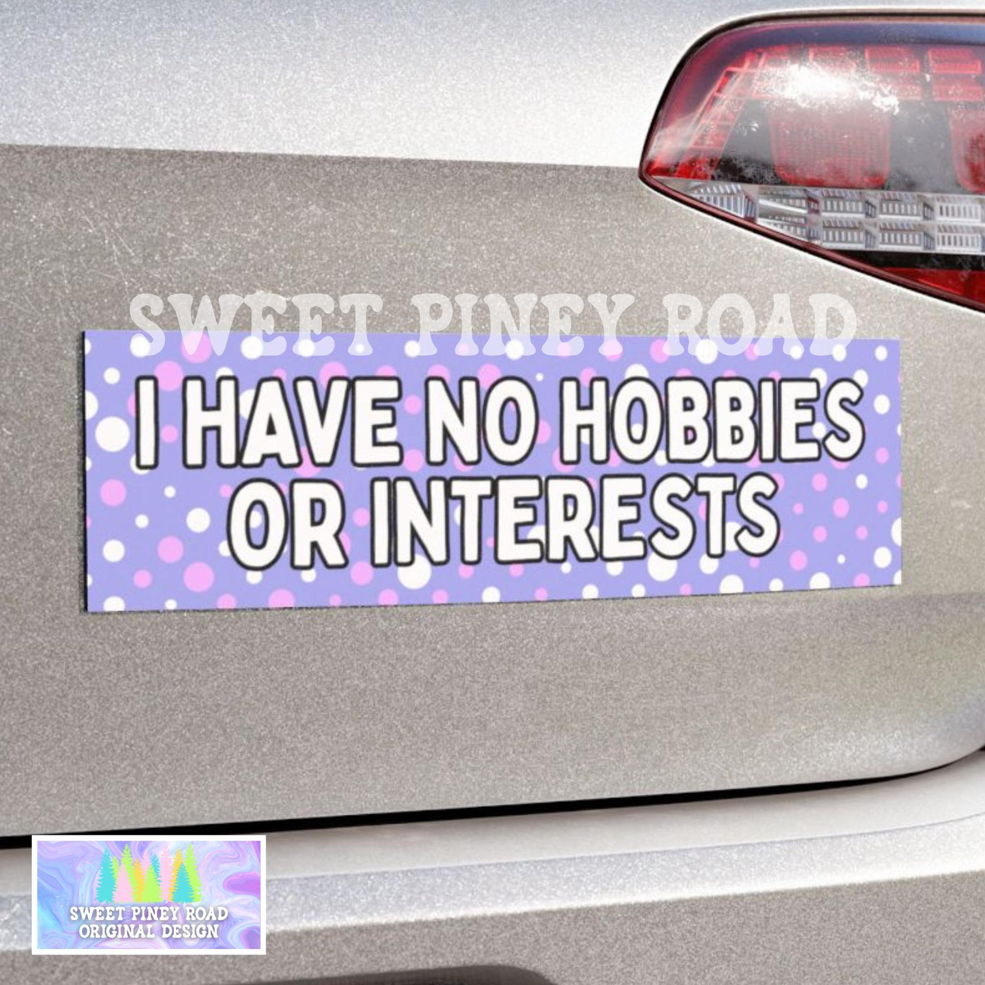 Purple polka dot bumper sticker that says I have no hobbies or interests.