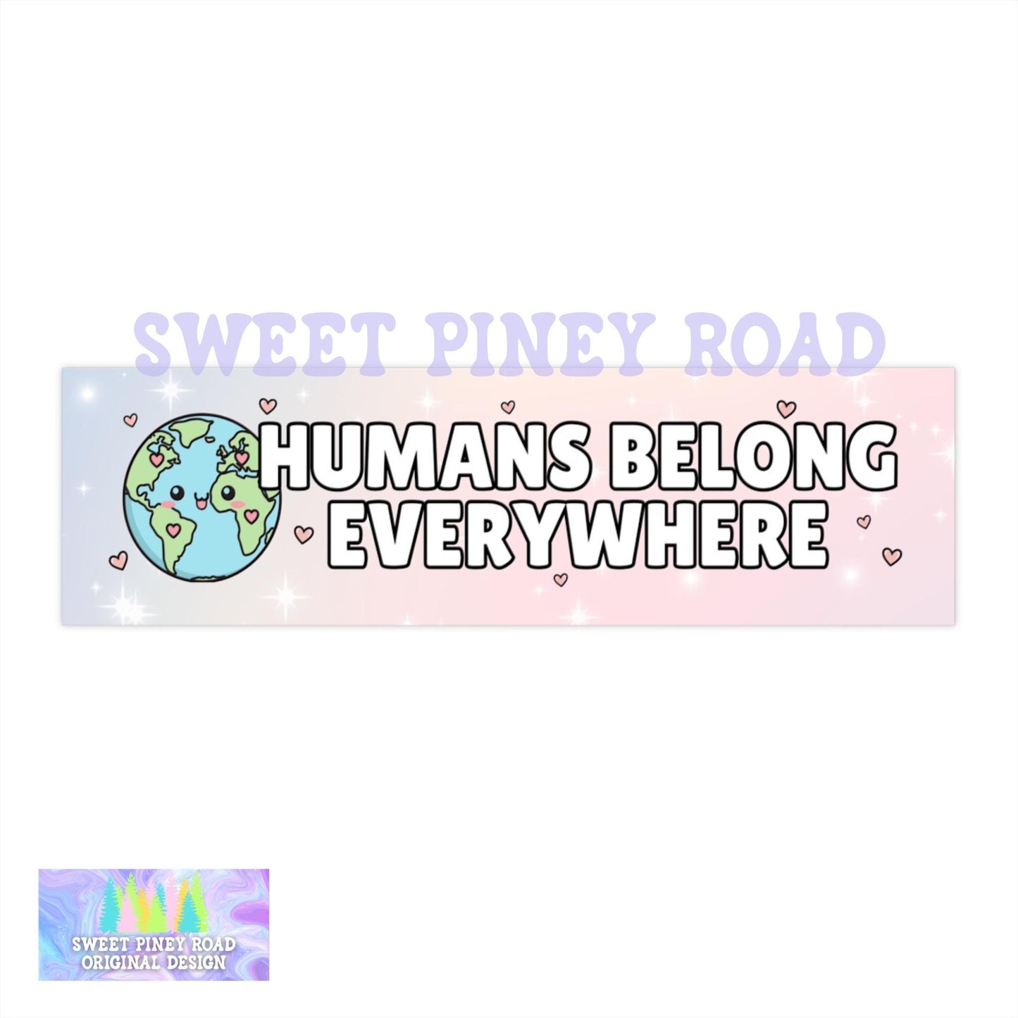 Kawaii pastel human rights sticker with the phrase “Humans Belong Everywhere,” photographed on a light background.