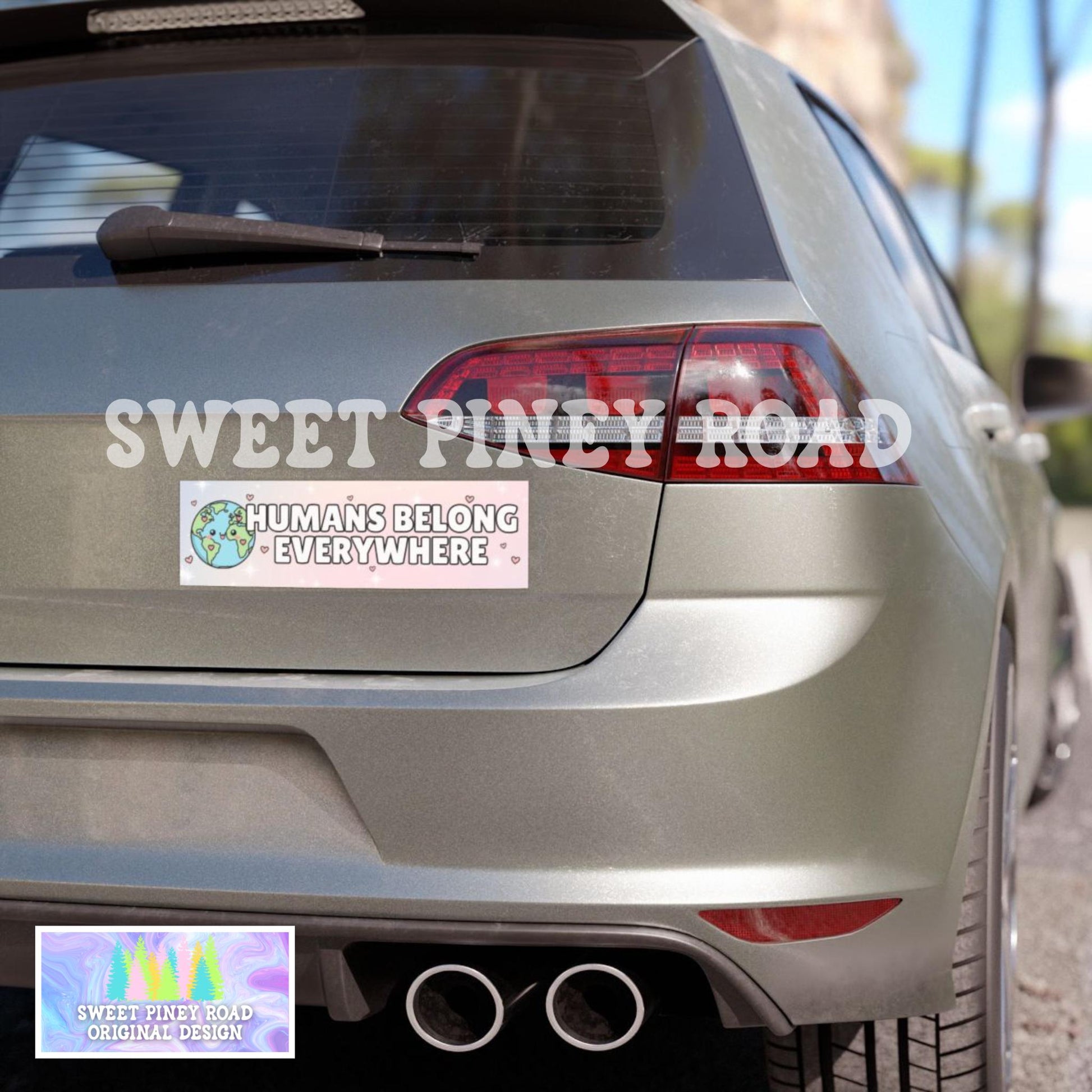 Pastel human rights bumper sticker displayed on a car, featuring the message “Humans Belong Everywhere” in a cute, inclusive style.