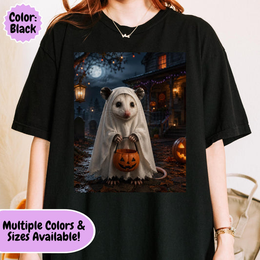 Cute possum wearing a ghost costume and holding a pumpkin trick or treat bucket in a moonlit Halloween scene with pumpkins, autumn leaves, and a spooky decorated house.