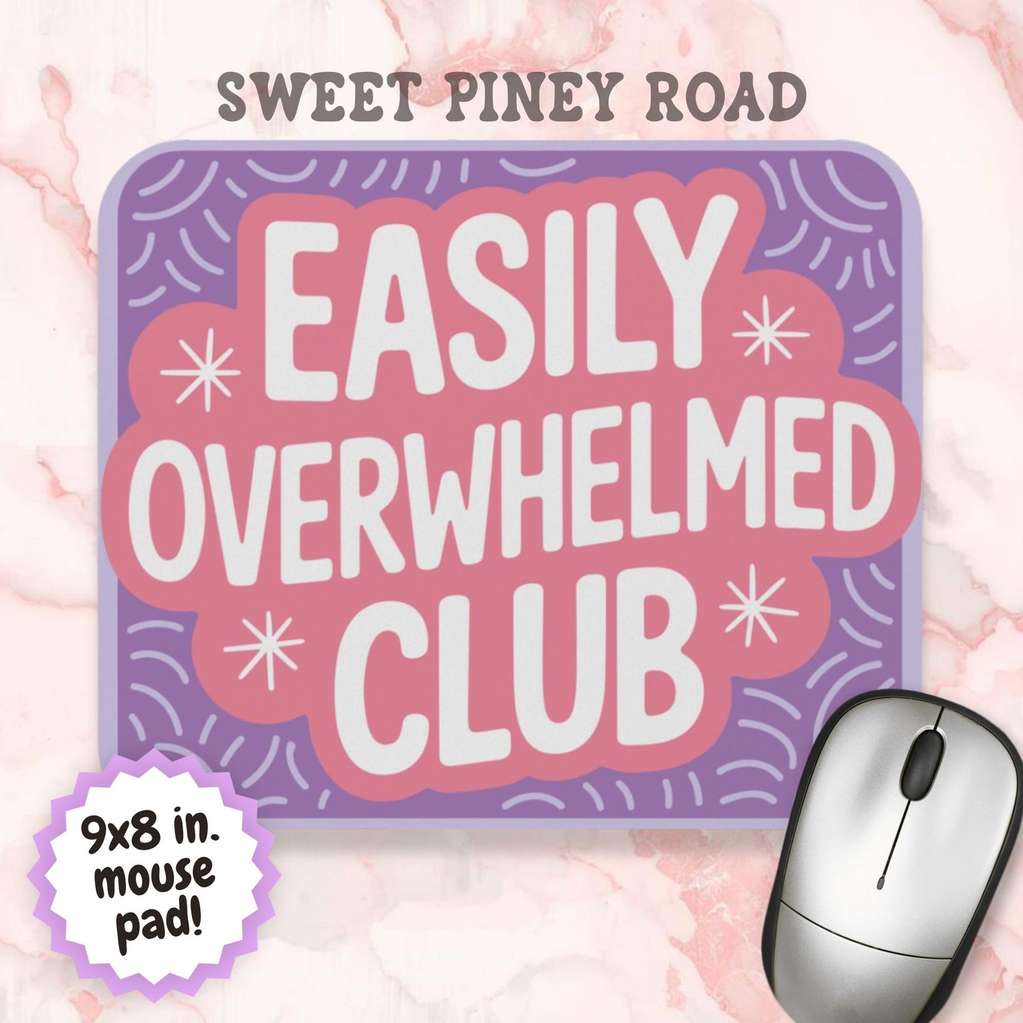 Pastel purple and pink mouse pad featuring the phrase "Easily Overwhelmed Club" in large white lettering. Colorful retro-style design with decorative starbursts and playful pattern accents, created as a humorous desk accessory for ADHD, anxiety, and mental health themed workspaces.