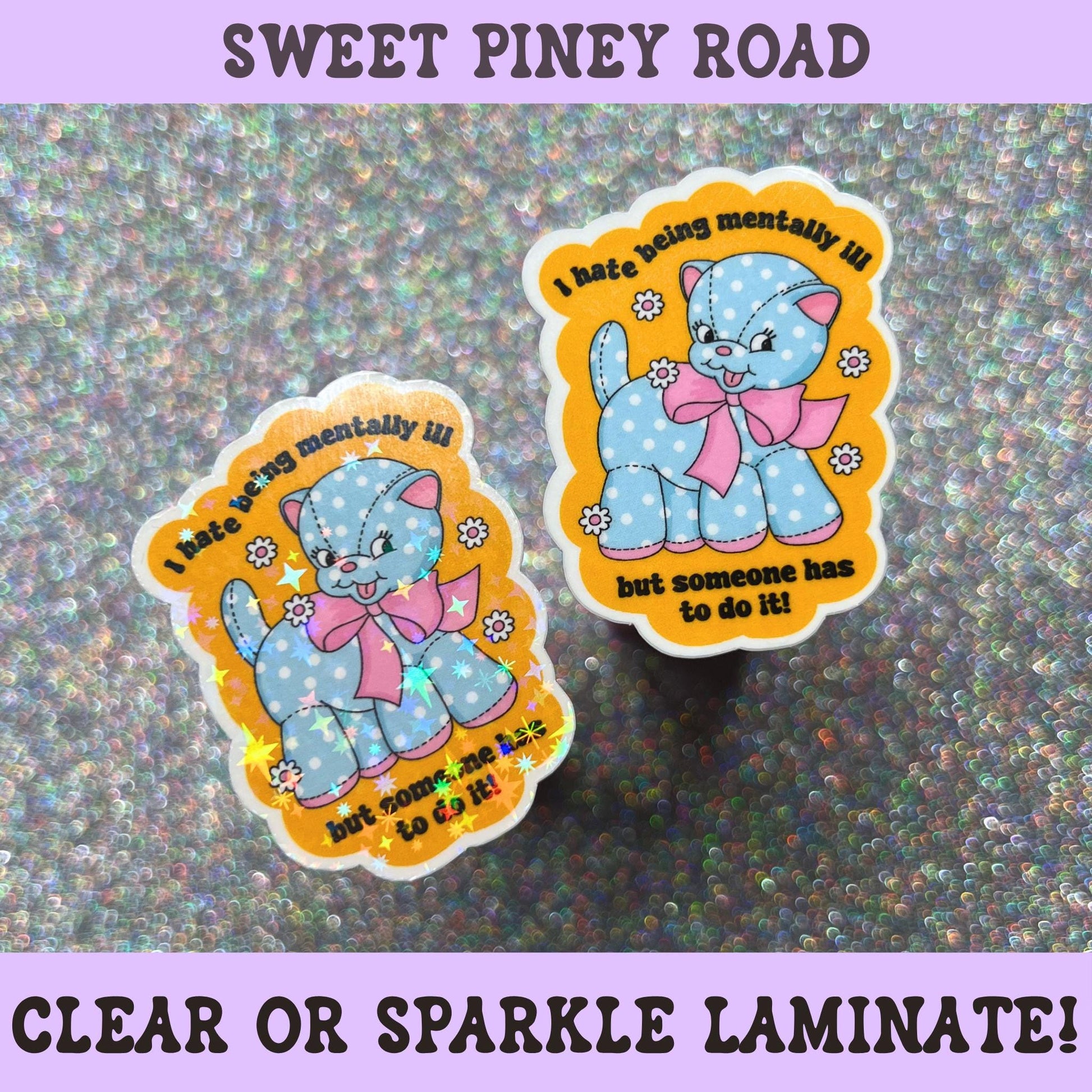 Cute plush blue cat sticker with pink bow and flowers featuring the phrase "I Hate Being Mentally Ill But Someone Has To Do It," combining mental health humor, anxiety humor, and kawaii aesthetics.