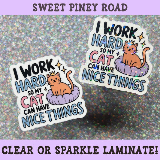 Cute orange cat sticker featuring the phrase "I Work Hard So My Cat Can Have Nice Things," perfect for cat lovers, cat moms, pet parents, and funny cat humor fans.
