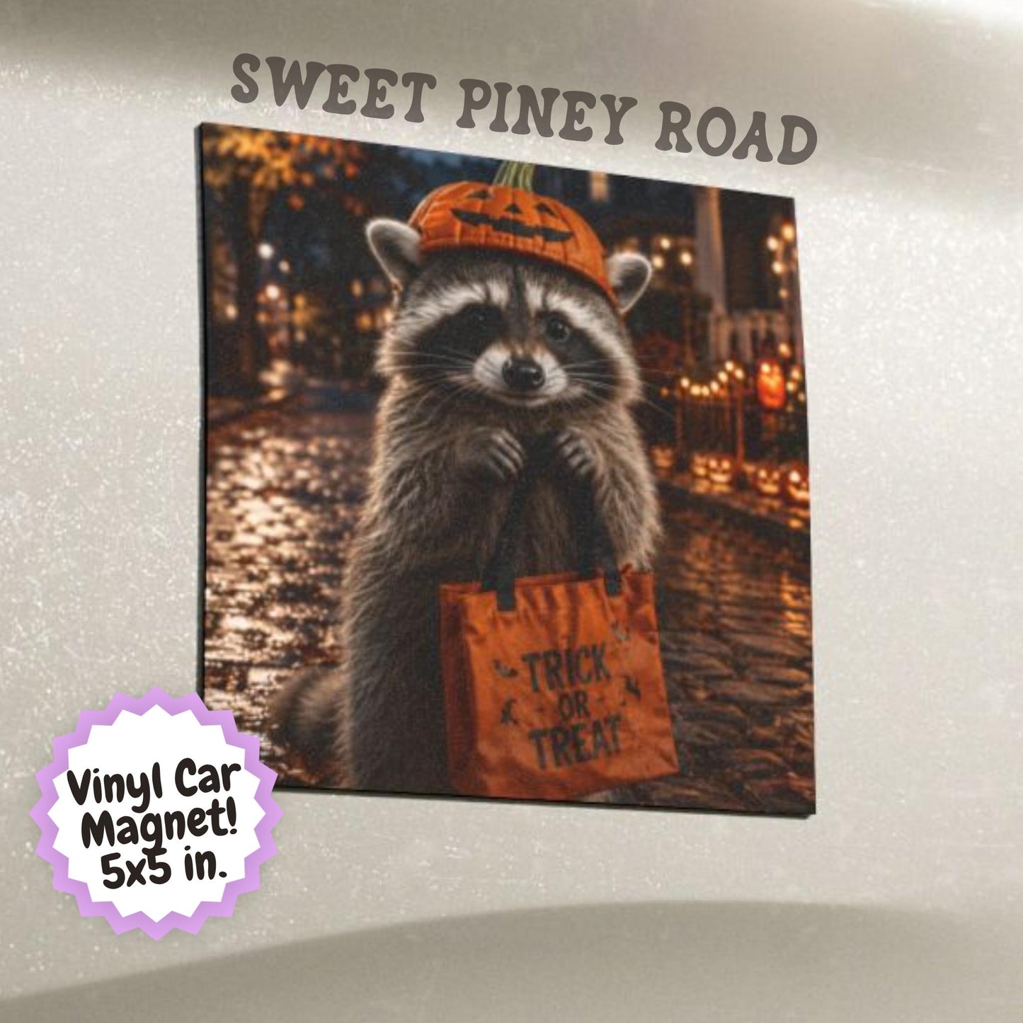 Cute raccoon wearing a pumpkin hat and holding a trick or treat bag on a Halloween night street, fall themed car magnet design.