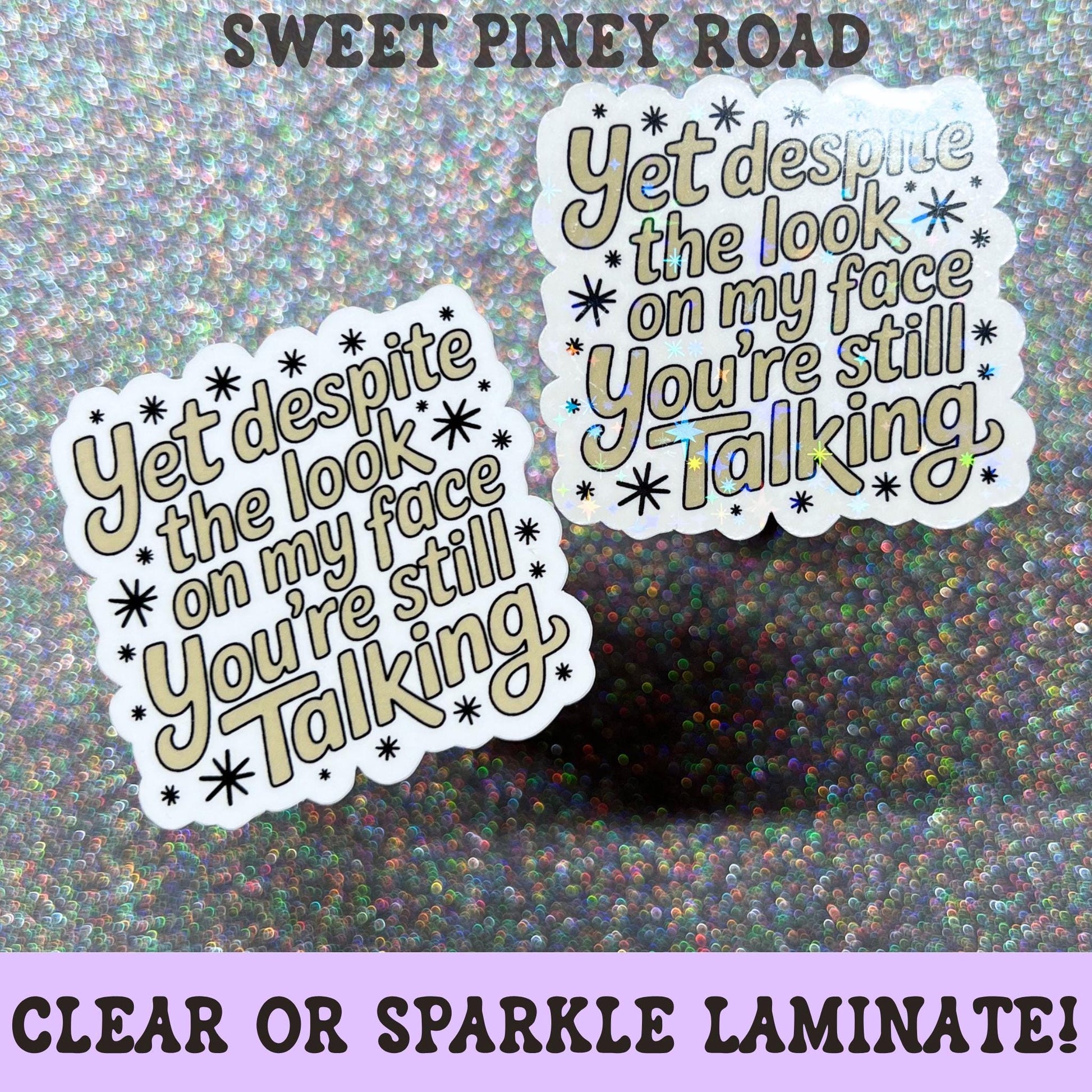 Funny sarcastic sticker featuring the phrase Yet Despite The Look On My Face You're Still Talking in retro cream lettering with decorative star accents.