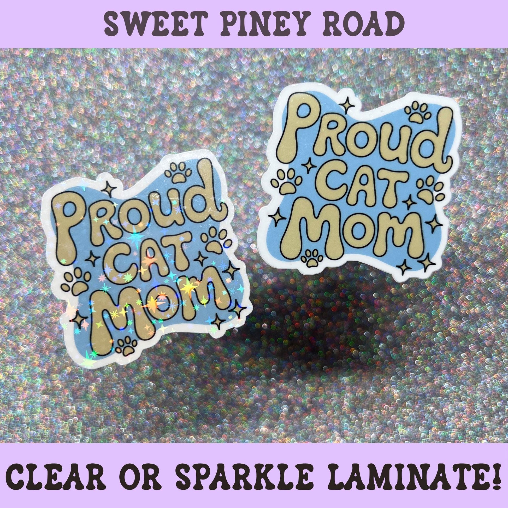 Cute Proud Cat Mom sticker with paw prints and sparkly accents in blue and cream colors, perfect for cat moms and cat lovers.