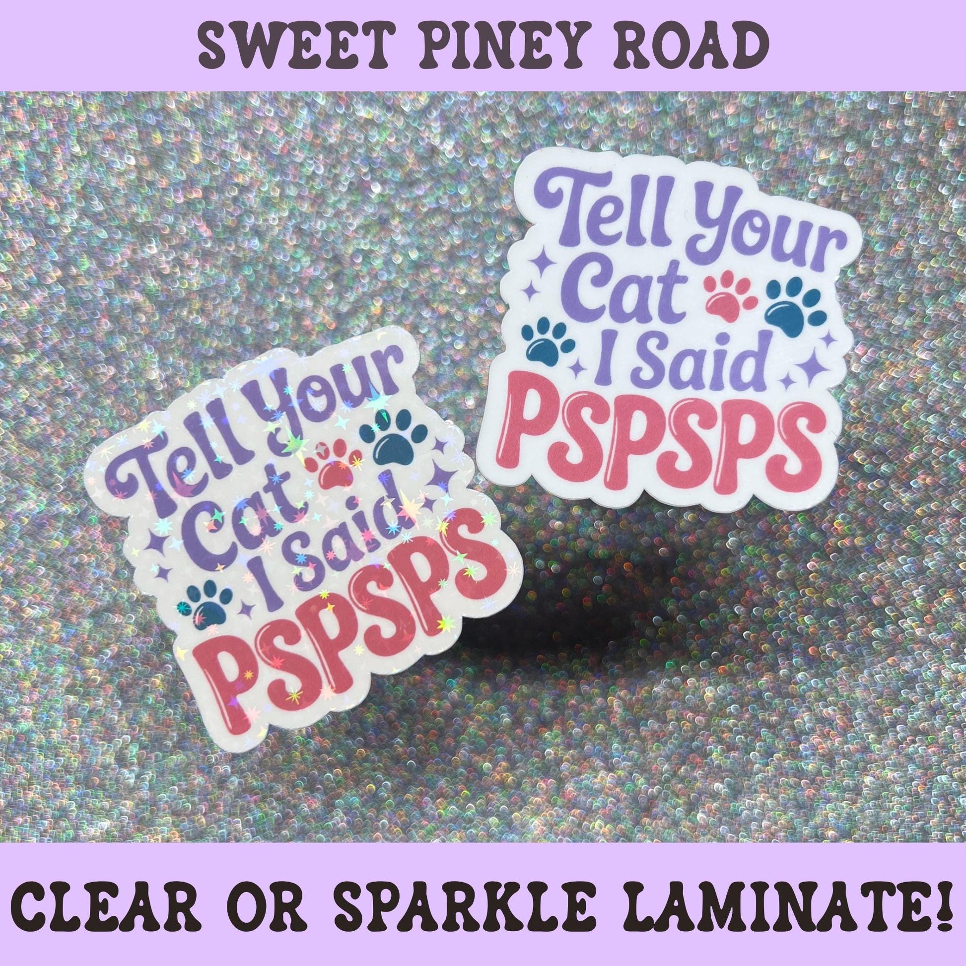 Colorful sticker reading "Tell Your Cat I Said Pspsps" with cat paw prints and playful lettering on a holographic sparkle background, funny gift for cat lovers and pet parents.